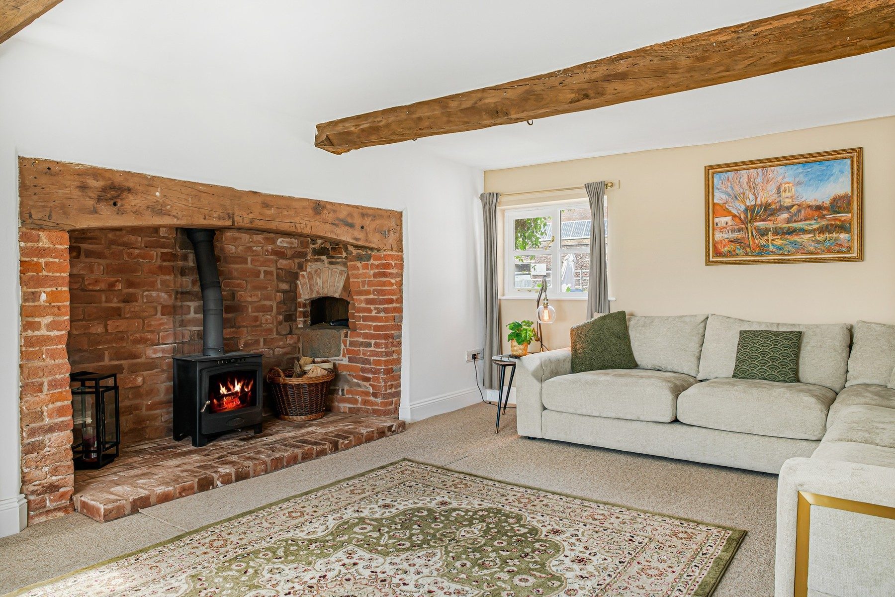 The inglenook fireplace in the sitting room